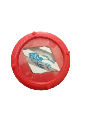 The top of the red cap with a small printed picture in its window